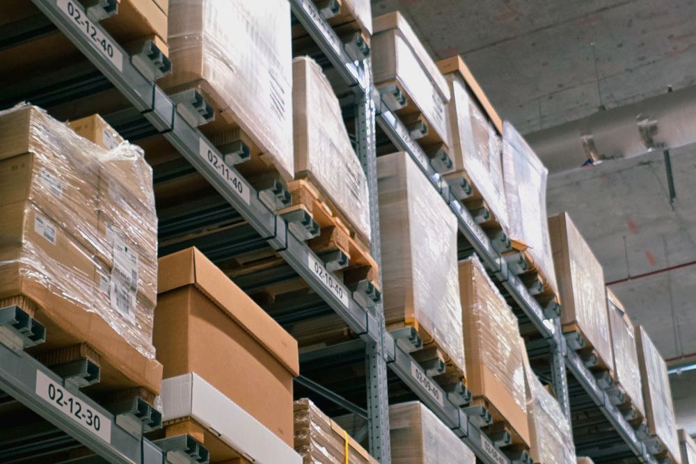 Warehouse racking stacked with palletized inventory