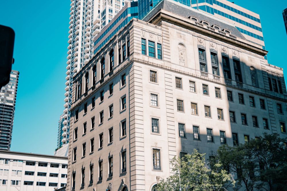 Classical stone commercial building on an American city street